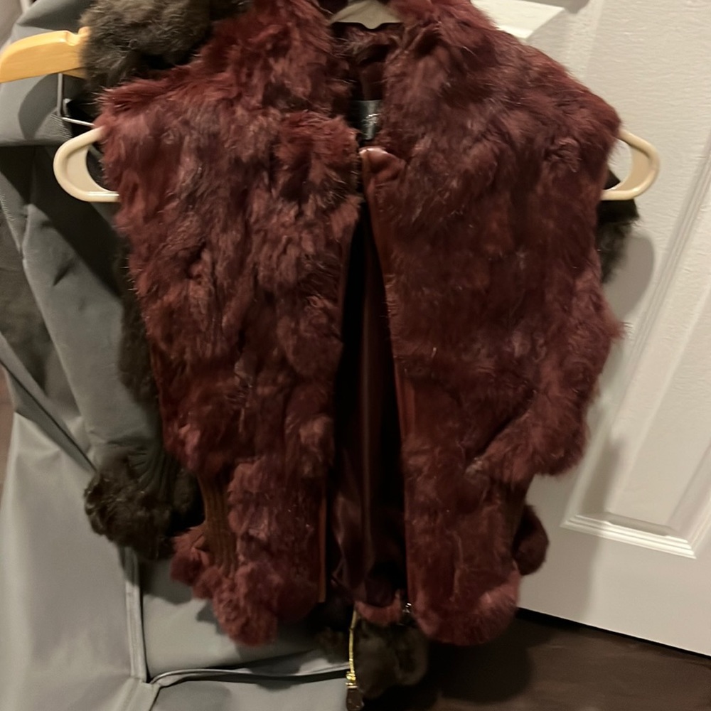 Burgundy real rabbit fur vest with cinched waist with sweater material.